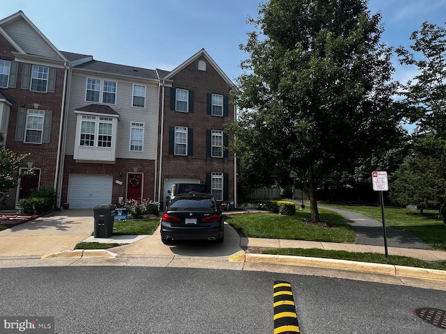 4107 Cressida Pl, Woodbridge, VA 22192 - multi unit property featuring a garage, concrete driveway, and brick siding