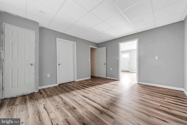 3706 Garrett Rd, Drexel Hill, PA 19026 - unfurnished bedroom featuring a drop ceiling and wood finished floors