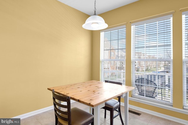 43559 Wheadon Ter, Chantilly, VA 20152 - dining space with baseboards and light tile patterned floors