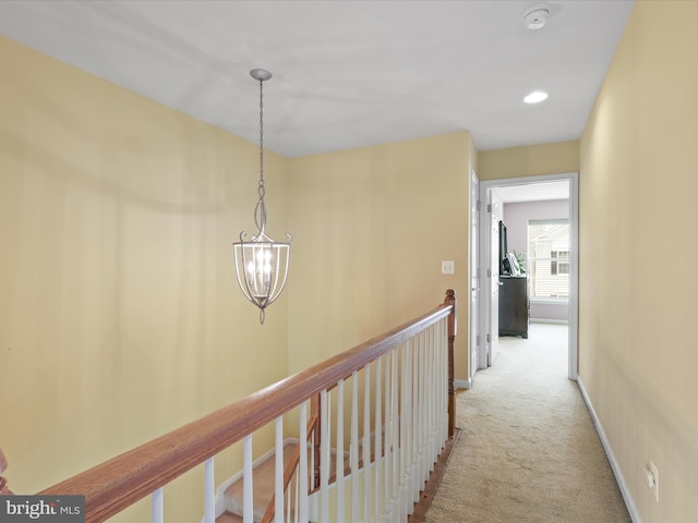 43559 Wheadon Ter, Chantilly, VA 20152 - corridor featuring a chandelier and light colored carpet