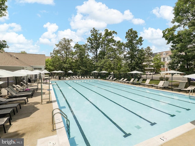 43559 Wheadon Ter, Chantilly, VA 20152 - community pool featuring a patio area