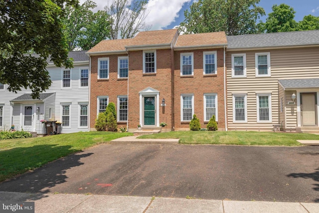 3112 Victoria Ct, Bensalem, PA 19020 - view of property featuring brick siding and a front lawn
