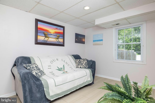 3112 Victoria Ct, Bensalem, PA 19020 - living area featuring a drop ceiling and baseboards