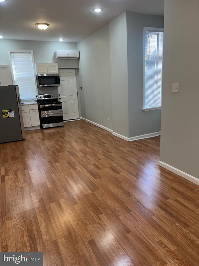 3637 N 19th St, Philadelphia, PA 19140 - unfurnished living room with wood finished floors and recessed lighting