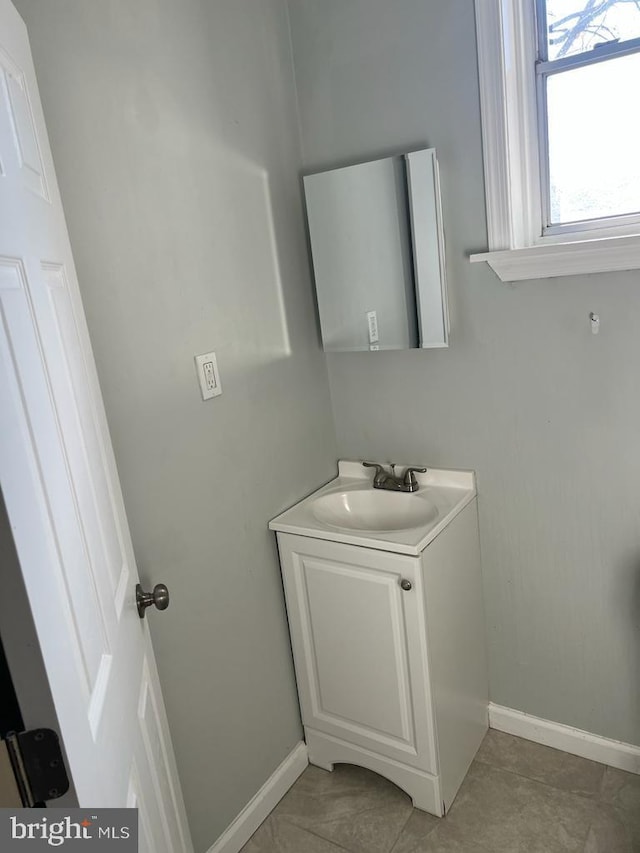 3637 N 19th St, Philadelphia, PA 19140 - bathroom featuring vanity and tile patterned flooring