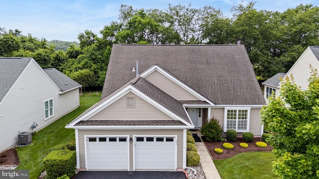 343 Daylilly Way, Middletown, DE 19709 - view of front of property with driveway, an attached garage, a front lawn, and a shingled roof
