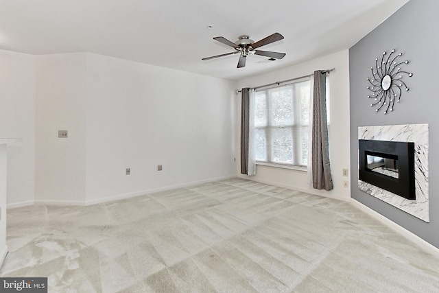 12915 Alton Sq Unit 307, Herndon, VA 20170 - unfurnished living room featuring light carpet, a high end fireplace, and ceiling fan