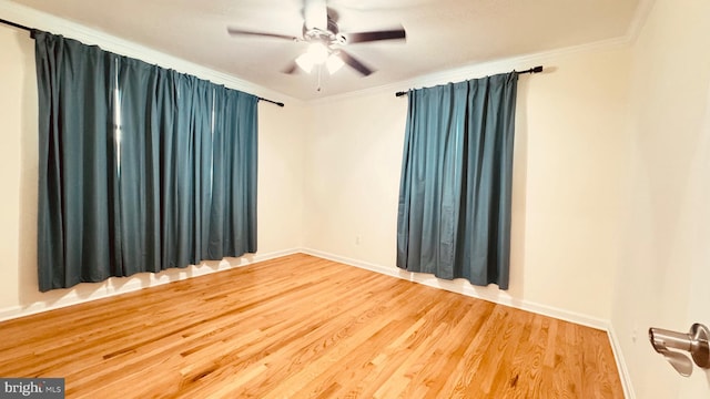 2323 Flag Marsh, Mount Airy, MD 21771 - spare room with ornamental molding, wood finished floors, and a ceiling fan