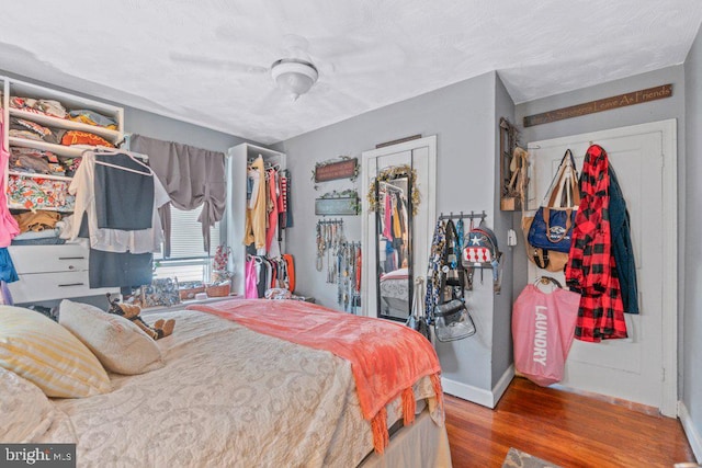 4433 Forest View Ave, Baltimore, MD 21206 - bedroom with wood finished floors and a ceiling fan