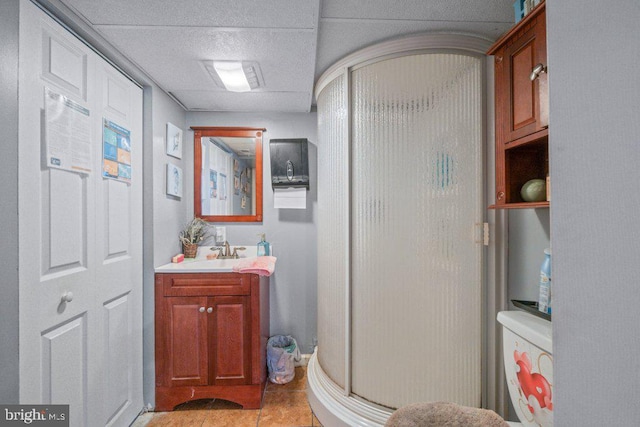 4433 Forest View Ave, Baltimore, MD 21206 - bathroom featuring vanity, a shower stall, and tile patterned flooring