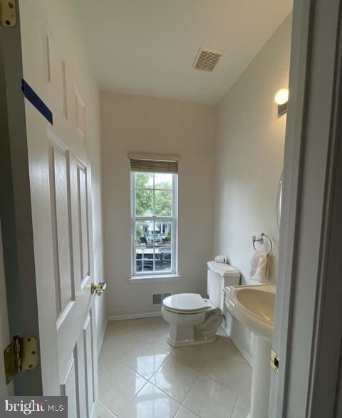 302 Lisa, Cinnaminson, NJ 08077 - half bath featuring toilet and tile patterned flooring
