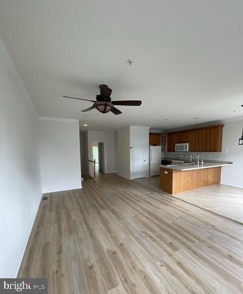 302 Lisa, Cinnaminson, NJ 08077 - kitchen featuring white appliances, open floor plan, light countertops, light wood-style floors, and ornamental molding