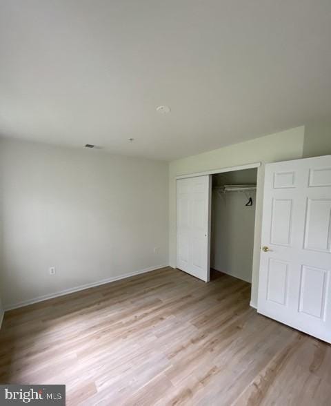 302 Lisa, Cinnaminson, NJ 08077 - unfurnished bedroom with light wood finished floors and a closet