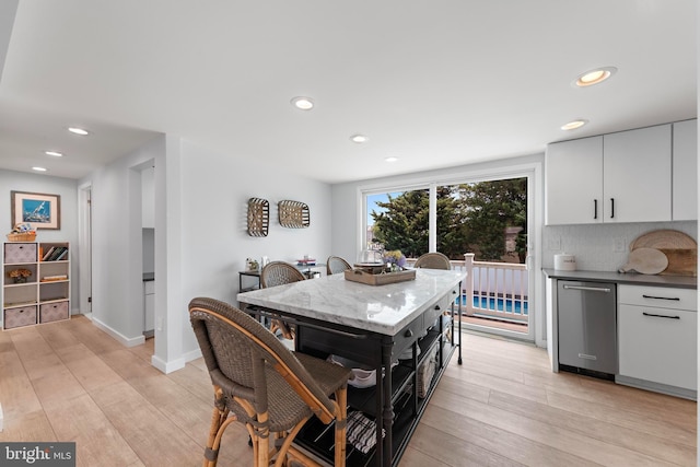 44 Harbor Ln, Long Beach Township, NJ 08008 - dining room with light wood-style floors, recessed lighting, and bar