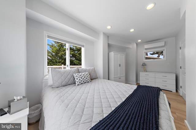 44 Harbor Ln, Long Beach Township, NJ 08008 - bedroom with recessed lighting, light wood-style flooring, and an AC wall unit