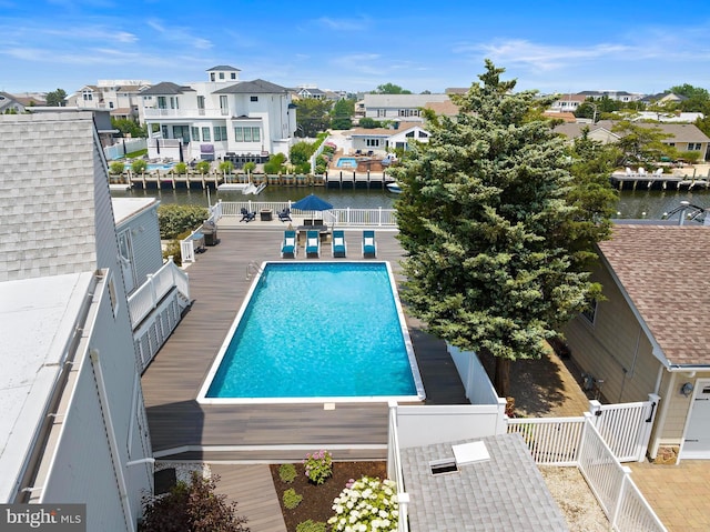 44 Harbor Ln, Long Beach Township, NJ 08008 - community pool with a residential view, a fenced backyard, and a water view