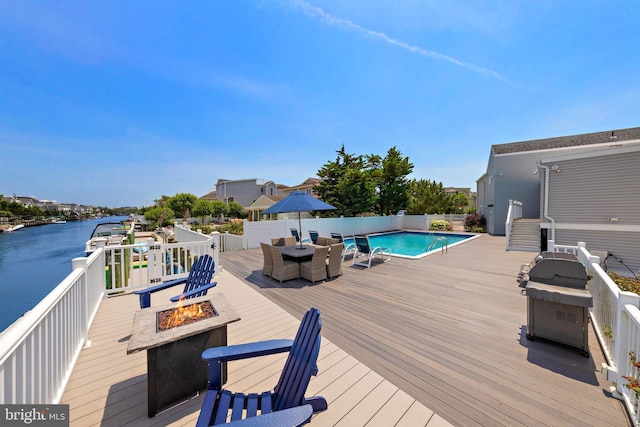 44 Harbor Ln, Long Beach Township, NJ 08008 - deck featuring an outdoor fire pit, a water view, and area for grilling