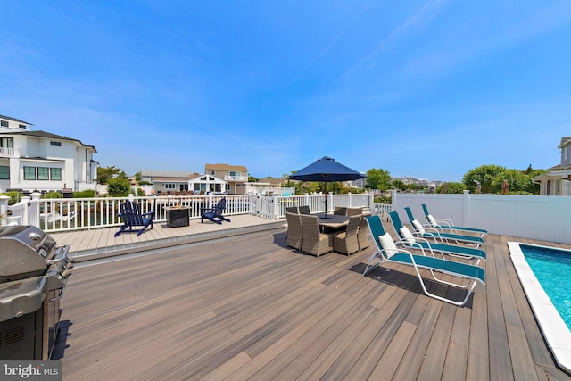 44 Harbor Ln, Long Beach Township, NJ 08008 - wooden deck featuring grilling area and outdoor dining area