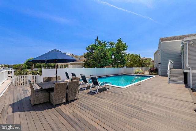 44 Harbor Ln, Long Beach Township, NJ 08008 - view of swimming pool featuring a wooden deck, outdoor dining space, and a fenced backyard