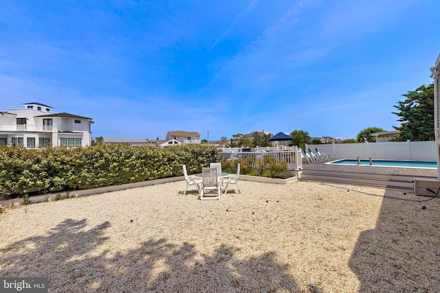 44 Harbor Ln, Long Beach Township, NJ 08008 - surrounding community featuring a swimming pool and a patio