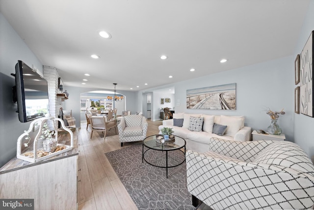 44 Harbor Ln, Long Beach Township, NJ 08008 - living room featuring a chandelier, hardwood / wood-style floors, recessed lighting, and arched walkways