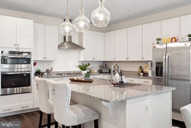 12606 Rosencrans Dr, Hagerstown, MD 21740 - kitchen with stainless steel appliances, white cabinets, and a breakfast bar area