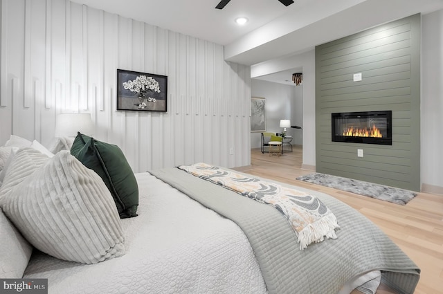 3708 Fairview Ave, Baltimore, MD 21216 - bedroom featuring wood finished floors, a fireplace, recessed lighting, and a ceiling fan