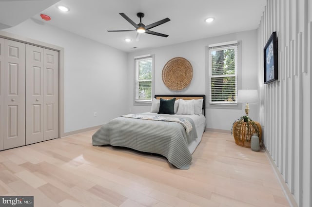 3708 Fairview Ave, Baltimore, MD 21216 - bedroom featuring light wood finished floors, multiple windows, recessed lighting, a closet, and a ceiling fan
