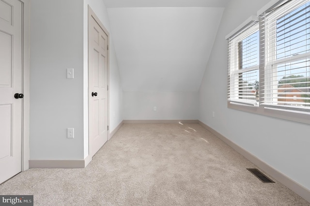 3708 Fairview Ave, Baltimore, MD 21216 - unfurnished bedroom with vaulted ceiling and carpet flooring