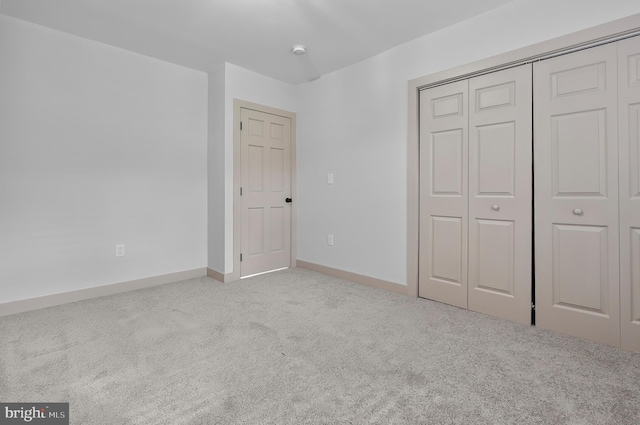 3708 Fairview Ave, Baltimore, MD 21216 - unfurnished bedroom with carpet and a closet