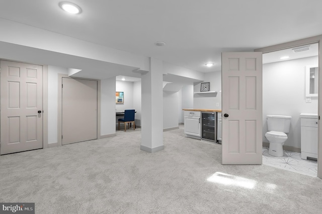 3708 Fairview Ave, Baltimore, MD 21216 - finished basement featuring wine cooler, light colored carpet, a dry bar, and recessed lighting