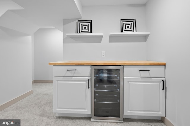 3708 Fairview Ave, Baltimore, MD 21216 - indoor dry bar featuring wine cooler and light carpet