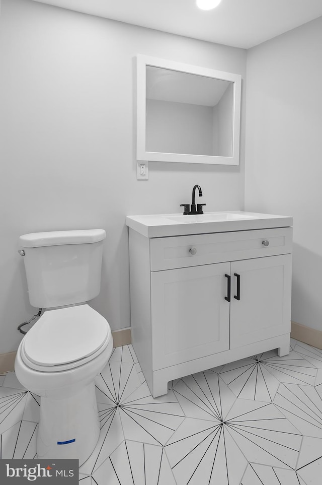 3708 Fairview Ave, Baltimore, MD 21216 - half bathroom with vanity and baseboards
