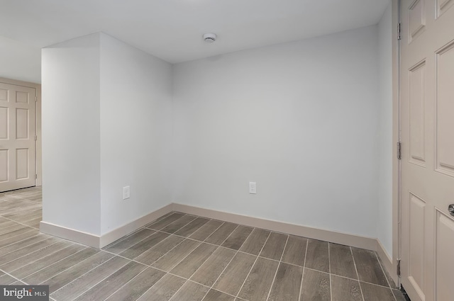 3708 Fairview Ave, Baltimore, MD 21216 - spare room featuring wood finished floors and a smoke detector
