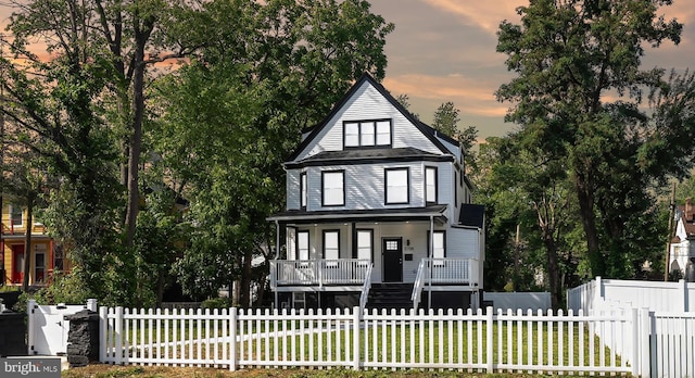 3708 Fairview Ave, Baltimore, MD 21216 - view of front of home with covered porch and a fenced front yard