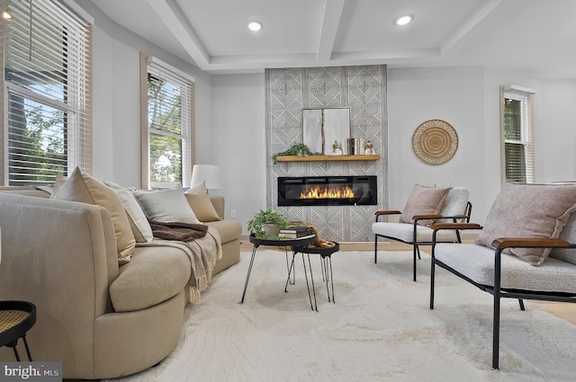 3708 Fairview Ave, Baltimore, MD 21216 - living area featuring a tiled fireplace, beamed ceiling, and recessed lighting