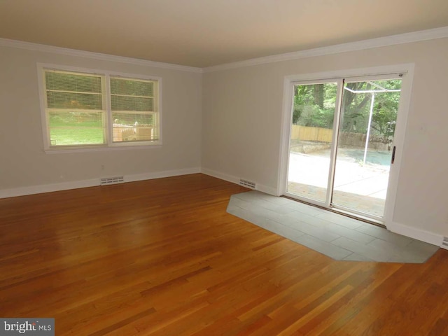 863 Yorklyn Rd, Hockessin, DE 19707 - unfurnished room featuring wood finished floors and crown molding