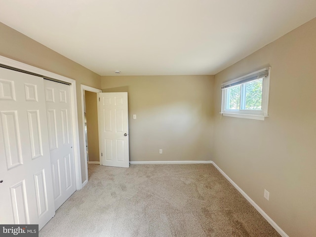 663 Topeka Ave, Mantua, NJ 08051 - unfurnished bedroom featuring light carpet and a closet