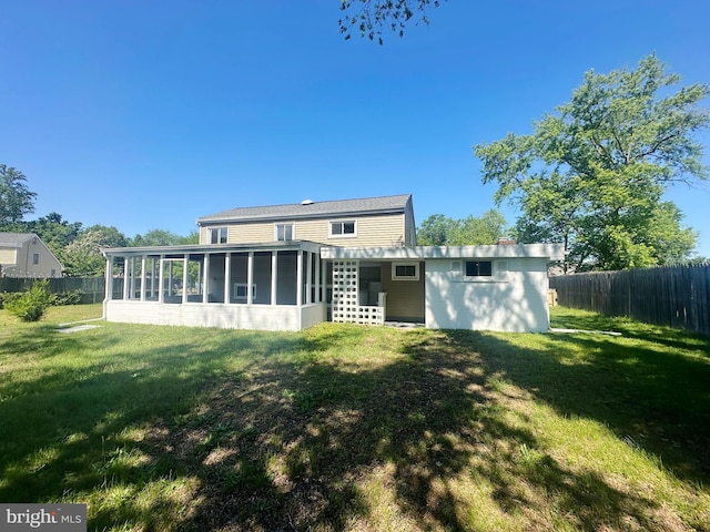 663 Topeka Ave, Mantua, NJ 08051 - rear view of house with a sunroom