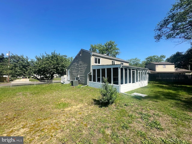 663 Topeka Ave, Mantua, NJ 08051 - back of house featuring a sunroom