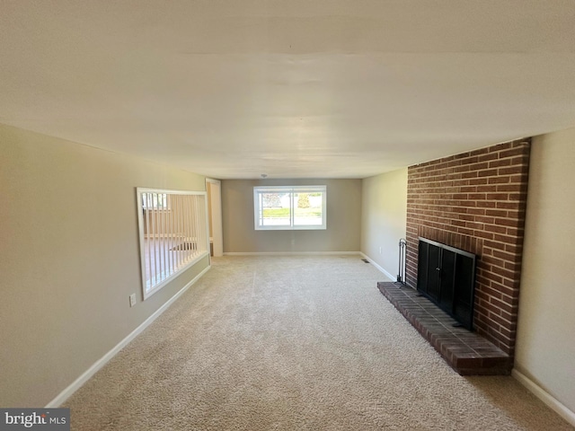 663 Topeka Ave, Mantua, NJ 08051 - unfurnished living room with a fireplace and carpet