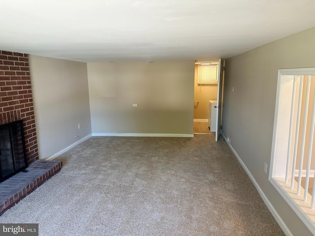 663 Topeka Ave, Mantua, NJ 08051 - unfurnished living room with carpet floors and a fireplace