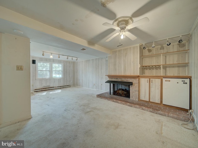 13217 Kephart Ln, Woodbridge, VA 22193 - unfurnished living room featuring track lighting, carpet, a baseboard heating unit, and ceiling fan