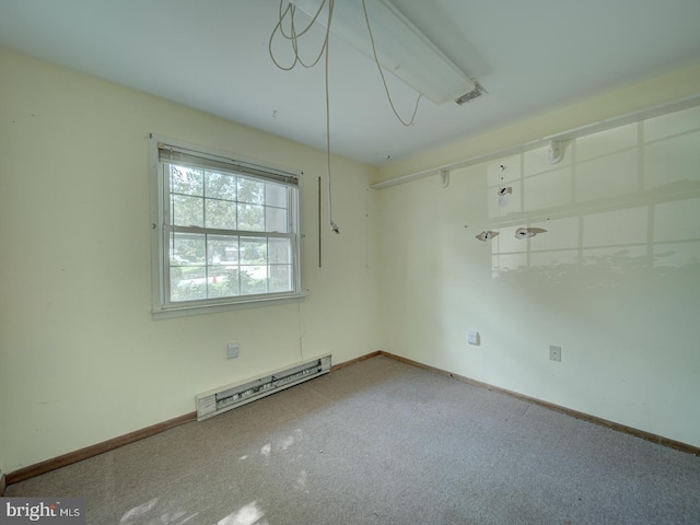 13217 Kephart Ln, Woodbridge, VA 22193 - empty room featuring a baseboard radiator and carpet flooring