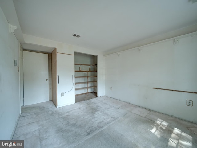 13217 Kephart Ln, Woodbridge, VA 22193 - unfurnished bedroom featuring a closet and unfinished concrete flooring
