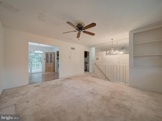 13217 Kephart Ln, Woodbridge, VA 22193 - carpeted empty room featuring a chandelier and a ceiling fan