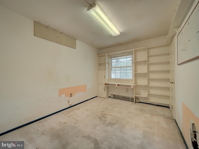13217 Kephart Ln, Woodbridge, VA 22193 - unfurnished room with a baseboard heating unit and light colored carpet