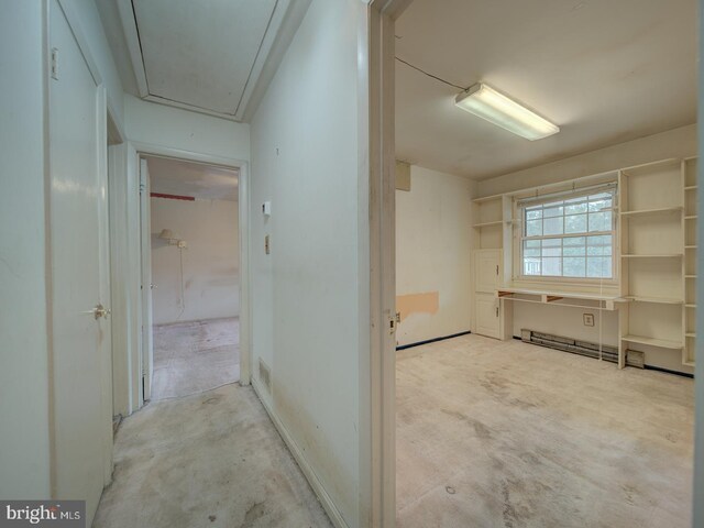 13217 Kephart Ln, Woodbridge, VA 22193 - hallway featuring attic access, unfinished concrete flooring, and a baseboard heating unit
