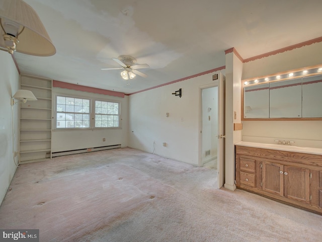 13217 Kephart Ln, Woodbridge, VA 22193 - unfurnished bedroom featuring a baseboard radiator, crown molding, light colored carpet, ensuite bathroom, and a ceiling fan