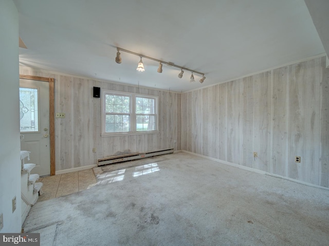 13217 Kephart Ln, Woodbridge, VA 22193 - carpeted empty room with baseboard heating and track lighting